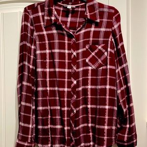 Burgundy, white, black, shimmery pink metallic threads, one pocket shirt.